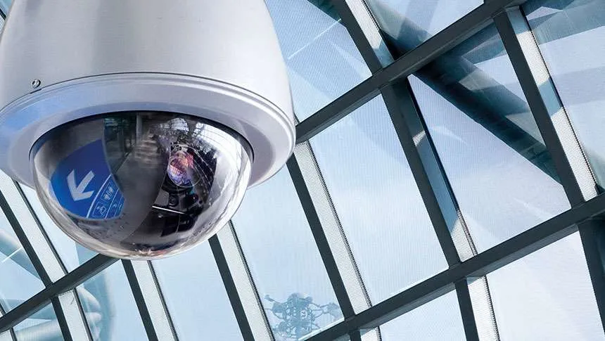 Security Cameras Behind Glass